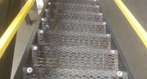 slip-resistant-expanded-metal-retrofitted-over-stairs