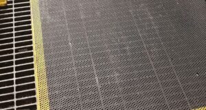 perforated plate with anti slip coating
