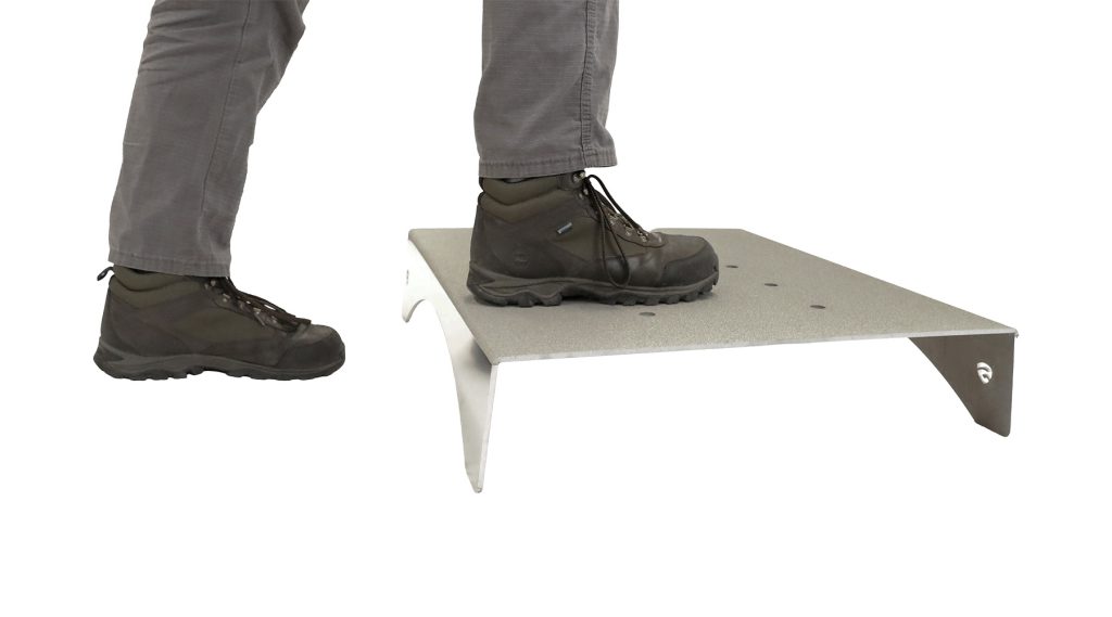 Boots on Stainless Steel Step